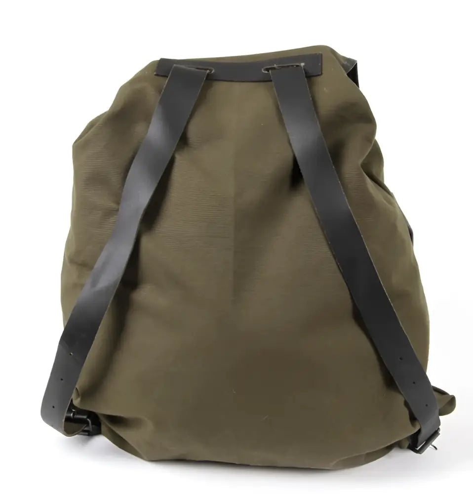 Olive green canvas backpack bear claw jätkän reppu with black leather straps and buckles, front view