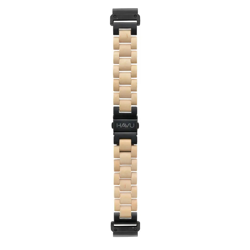 Beige puinen garmin quickfit ranneke koivua mustalla metallisoljella ja havu-logolla