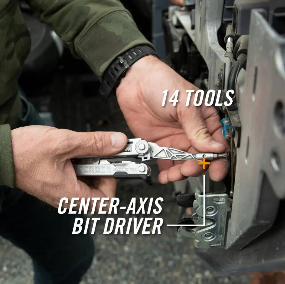 Silver and black gerber center drive plus multi tool with center axis bit driver made of durable metal