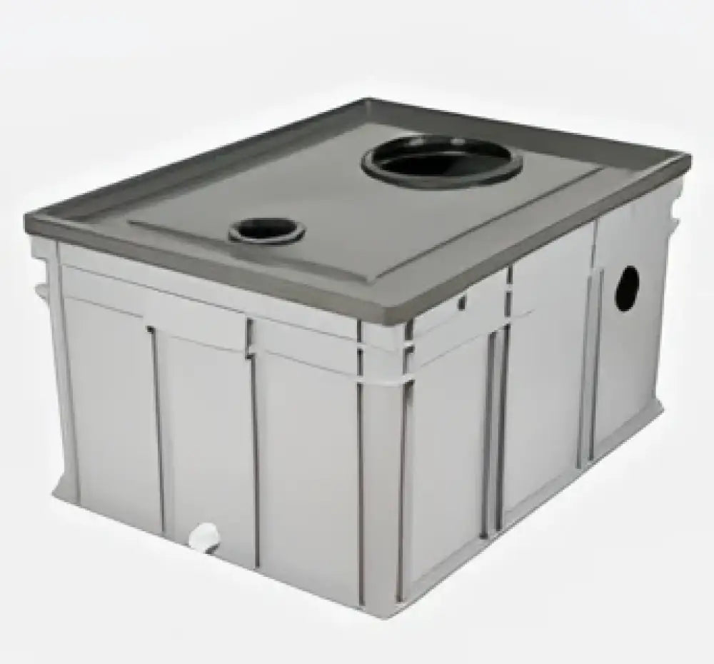 Silvermetallinen suorakaiteen muotoinen green toilet lux kasetti sisäkuivakäymälä harmaalla kannella ja näkyvillä pyöreillä käyttöaukoilla