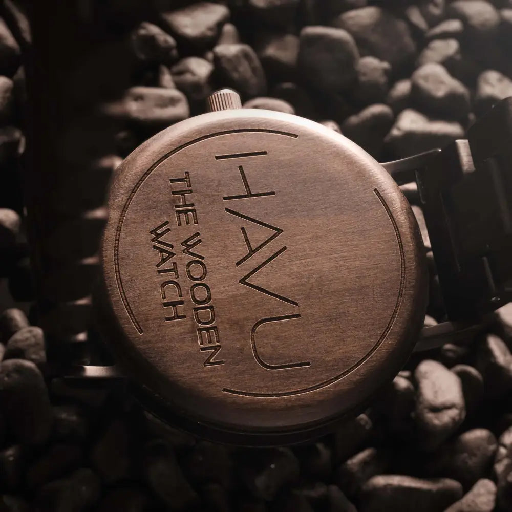 A rustic circular puinen rannekello with engraved hanu the wooden watch text and brushed finish for havu watches virta 42mm