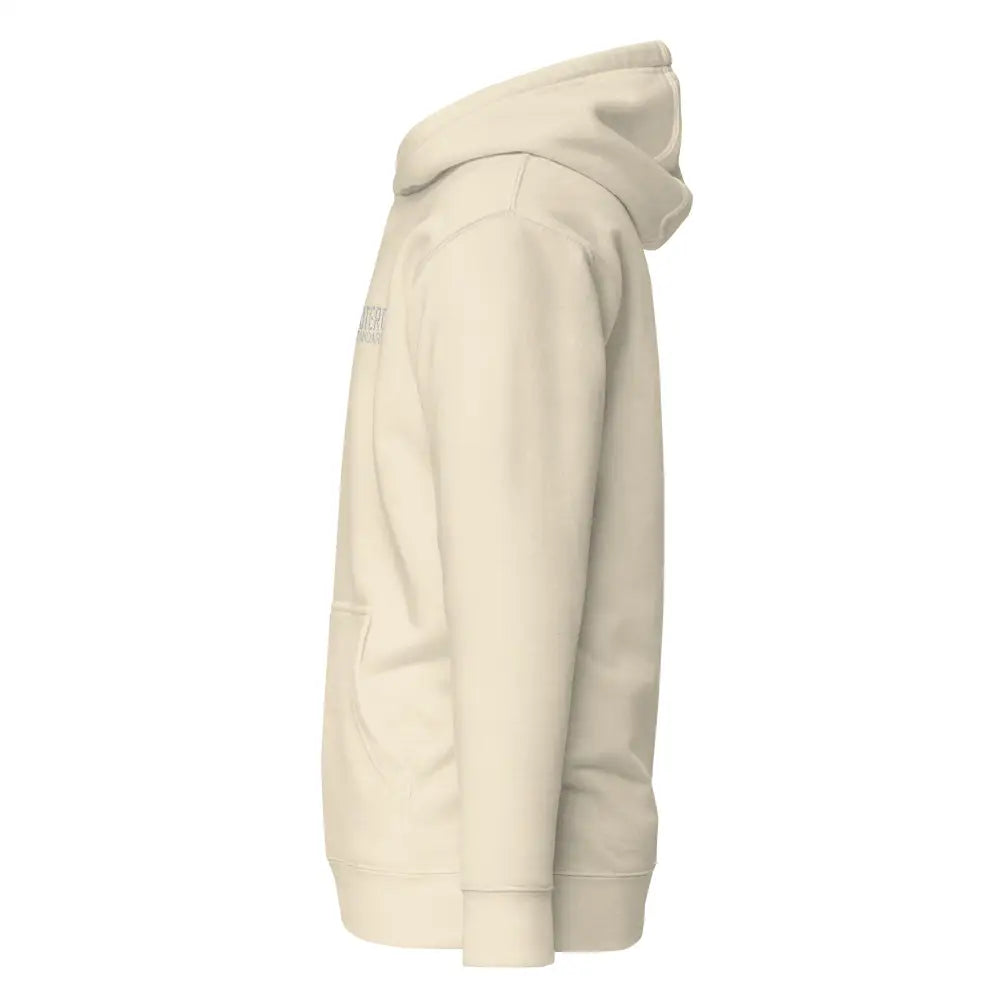 Cream-colored kenttälapio huppari with a subtle logo on the left chest in a comfortable hooded sweatshirt design