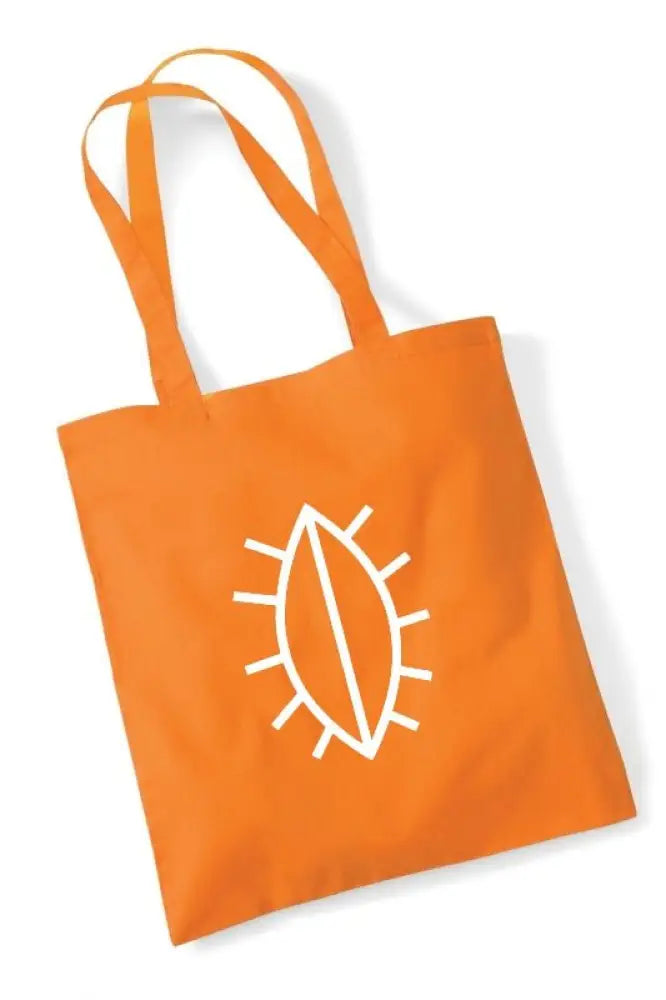 Kirkkovene kangaskassi on kirkkaan oranssi canvas-kassi valkoisella tyylitellyllä simpukkakuvioinnilla