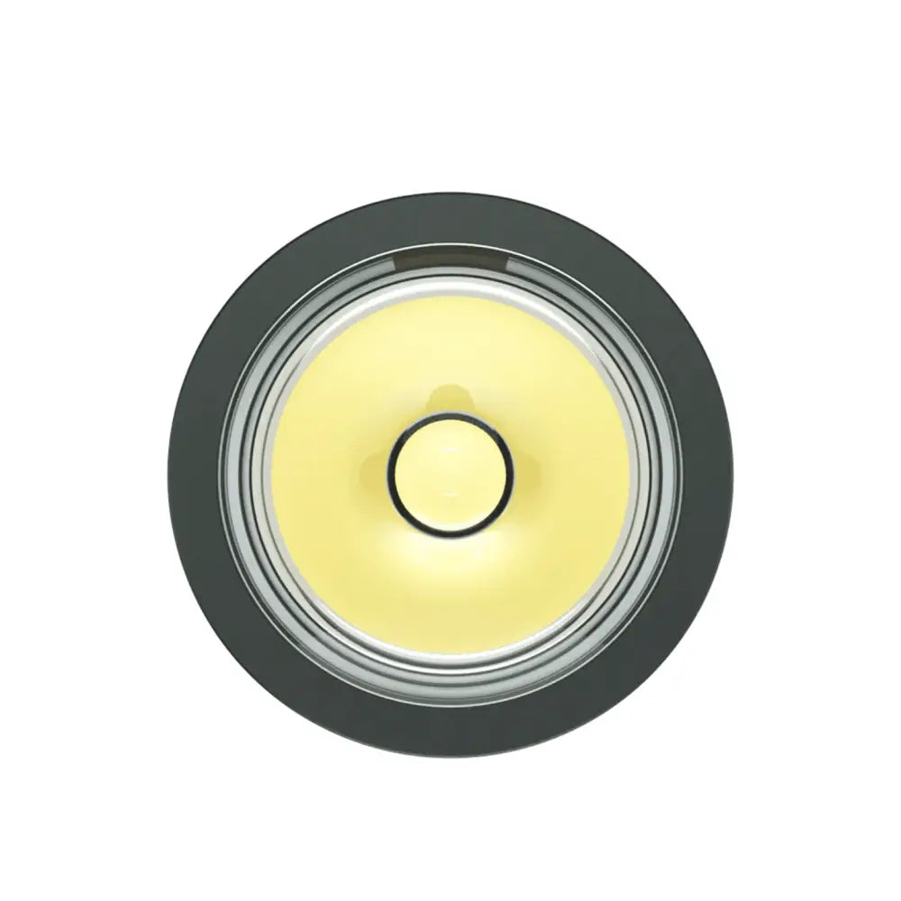 Black circular led lighthead with yellowish glow and metallic inner rings for pwr flashlight lighthead 900l