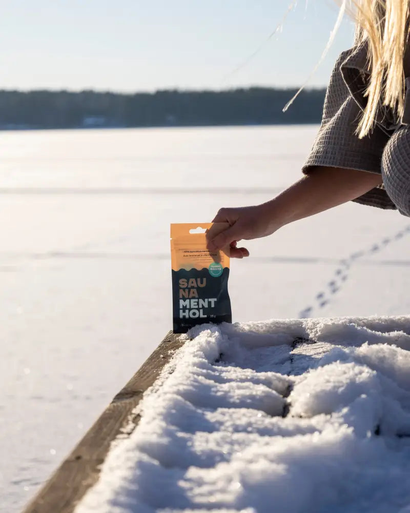 Vibrantti oranssi ja tummansinisä uudelleen suljettava sauna menthol alkuperäinen -pussi rohkealla tekstillä