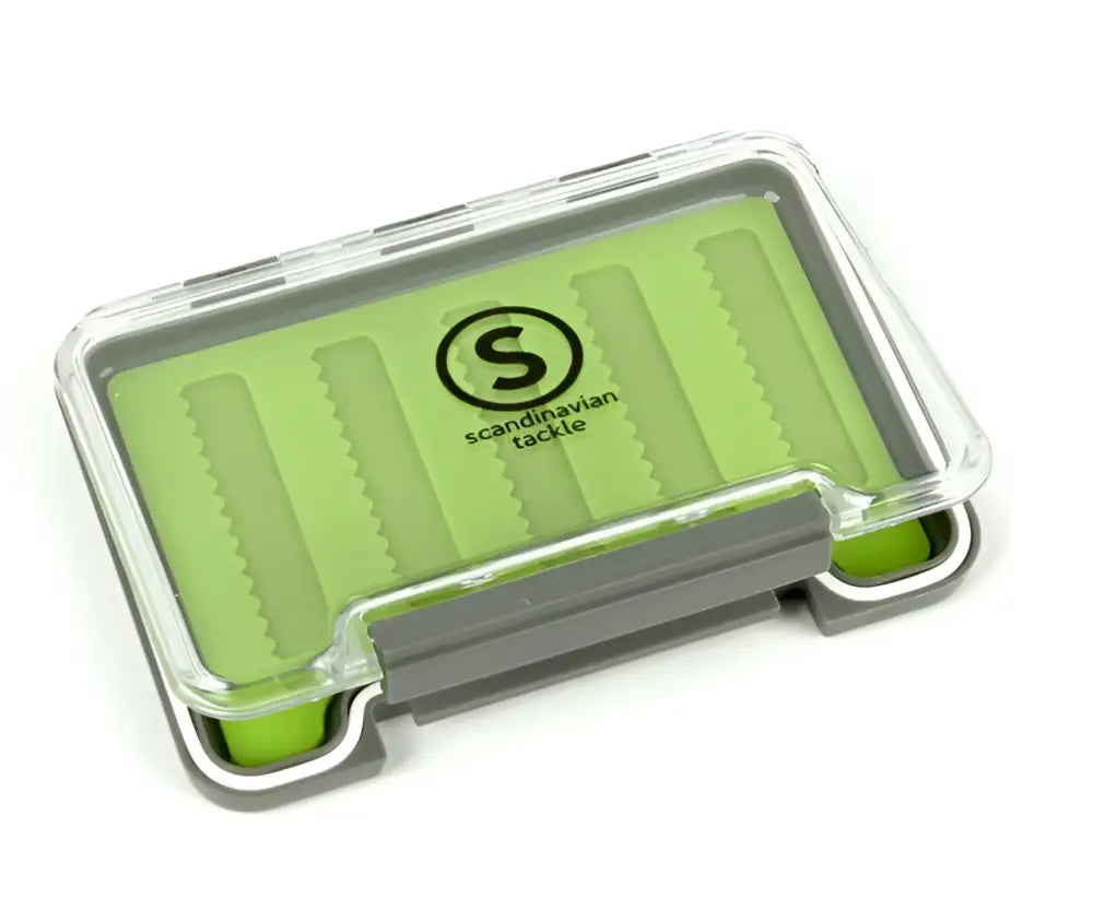 Clear plastic lid with lime green silicone insert and gray rubberized base of Scandinavian Tackle Slim Silicon Flybox S