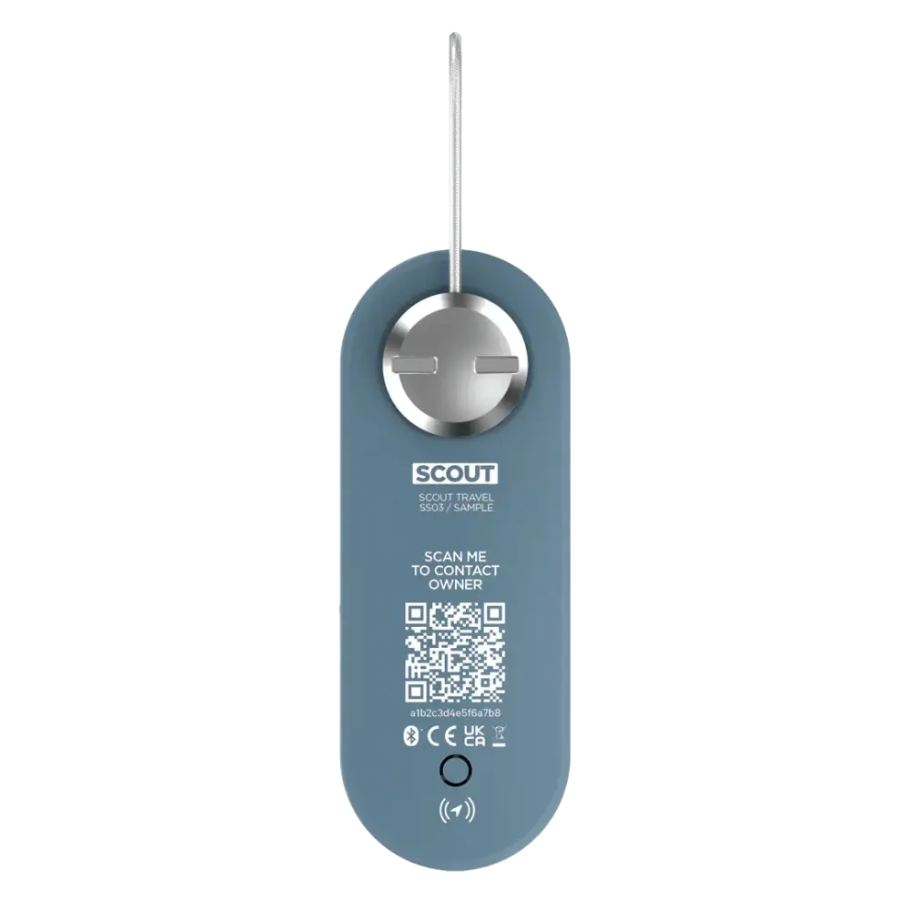 A sleek matte teal scout travel key fob with silver metallic button and integrated qr code for owner contact