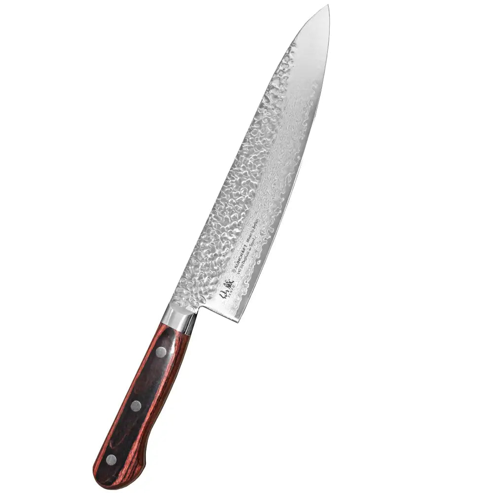 A sleek hammered stainless steel kokkiveitsi with a dark wood handle and silver rivets by Suncraft Senzo 21 cm