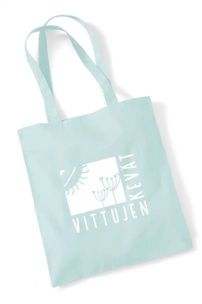 A light mint green canvas tote bag with white vittujen kevät logo text and botanical illustrations on the front