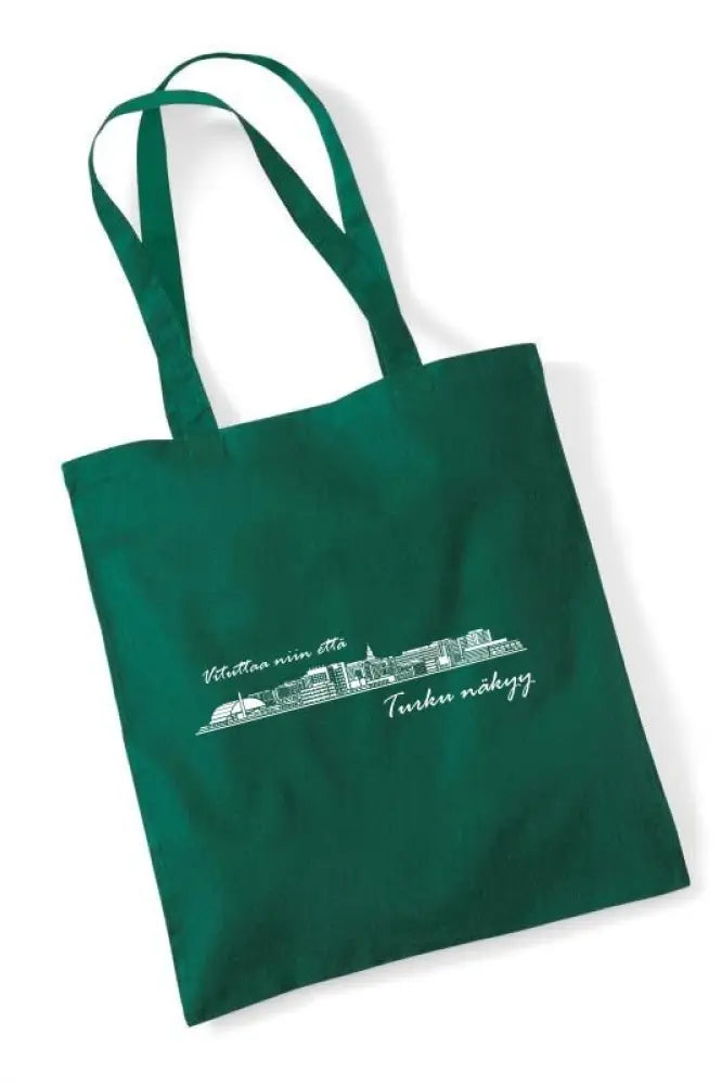 Deep green canvas tote bag with white line art Turku skyline and cursive text Vituttaa niin että Turku näkyy