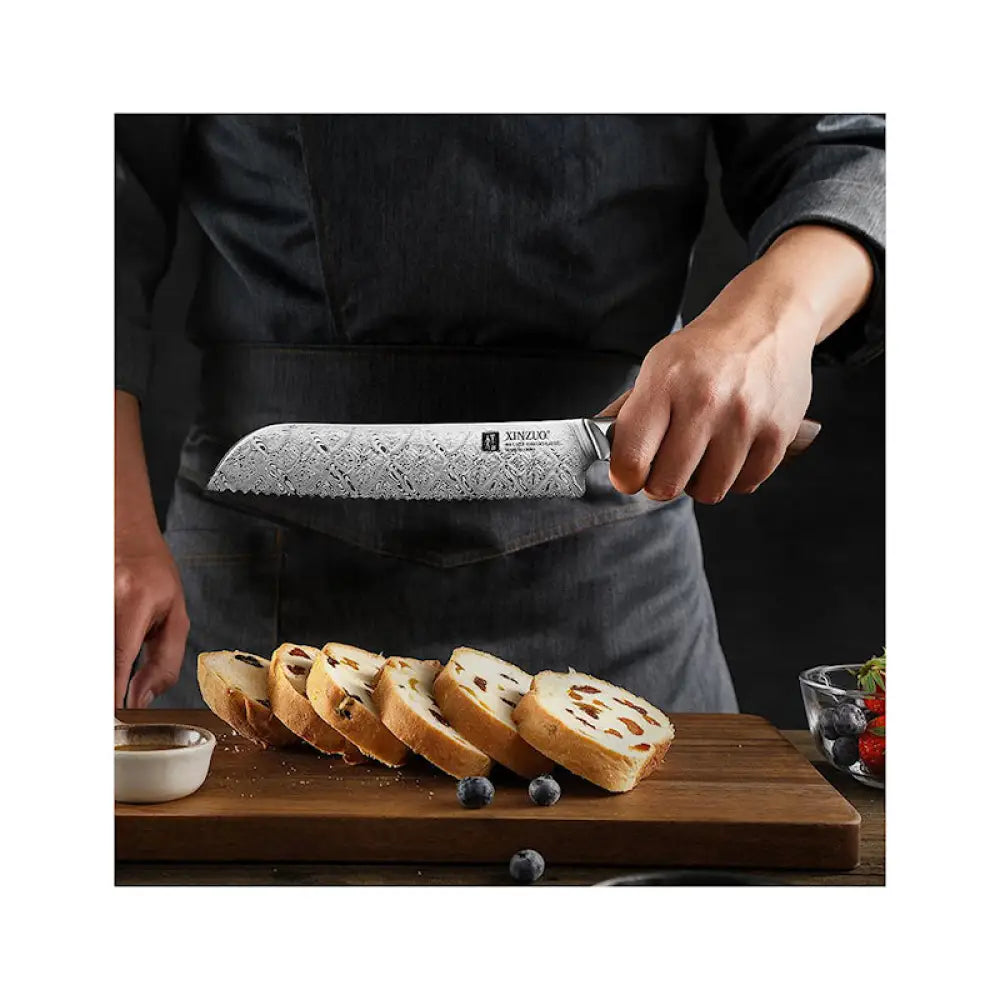 Hopeapuinen damaskoksiditeräinen xinzuo jiang damascus leipäveitsi 21 cm mustalla kahvalla ja sahahampaisella reunalla